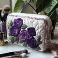 Beauty case trapuntato con petali eleganti NCU0DV7737