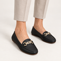 Clara timeless loafers in Black worn close-up