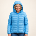 METTA Baby Blue padded jacket on mature model, front view