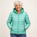 Metta transitional padded jacket in mint green — mature model front view