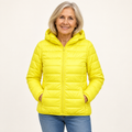 Metta transitional padded jacket in yellow — mature model front view