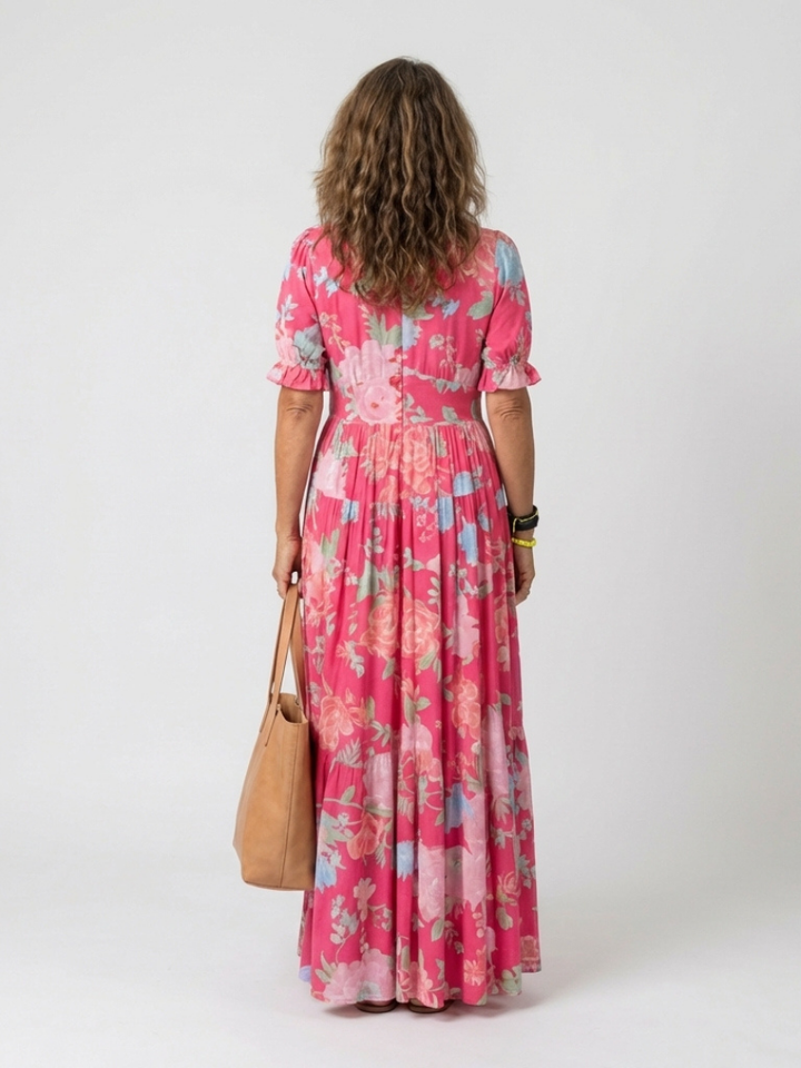 Ione | Korte mouwloze V-hals bloemenprint midi-jurk