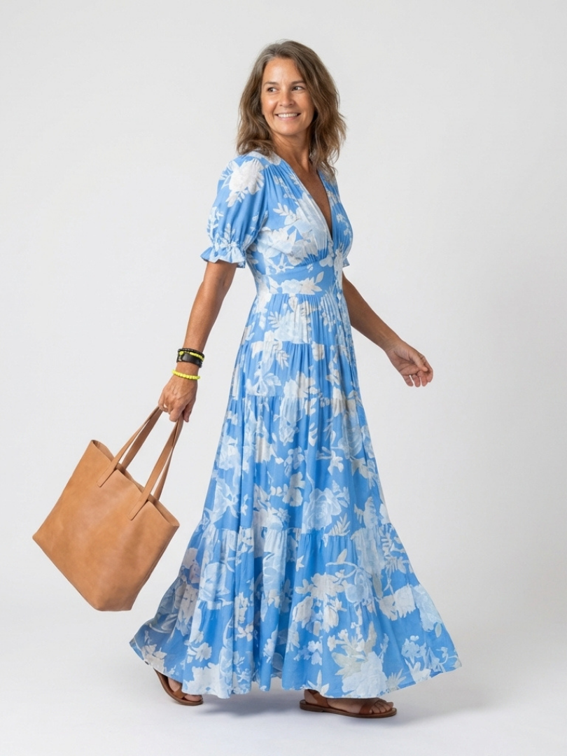 Ione | Korte mouwloze V-hals bloemenprint midi-jurk