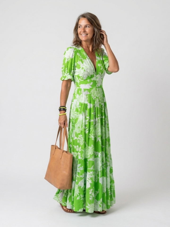Ione | Korte mouwloze V-hals bloemenprint midi-jurk