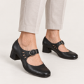 Clara low-cut Mary Jane shoes in Black worn close-up