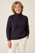 Adriana – Women's Turtleneck Ribbed Knit Jumper on a mature model
