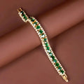 GOLD AND GREEN GEM BRACELET