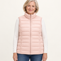 ISA Light Pink padded gilet on mature model, front view