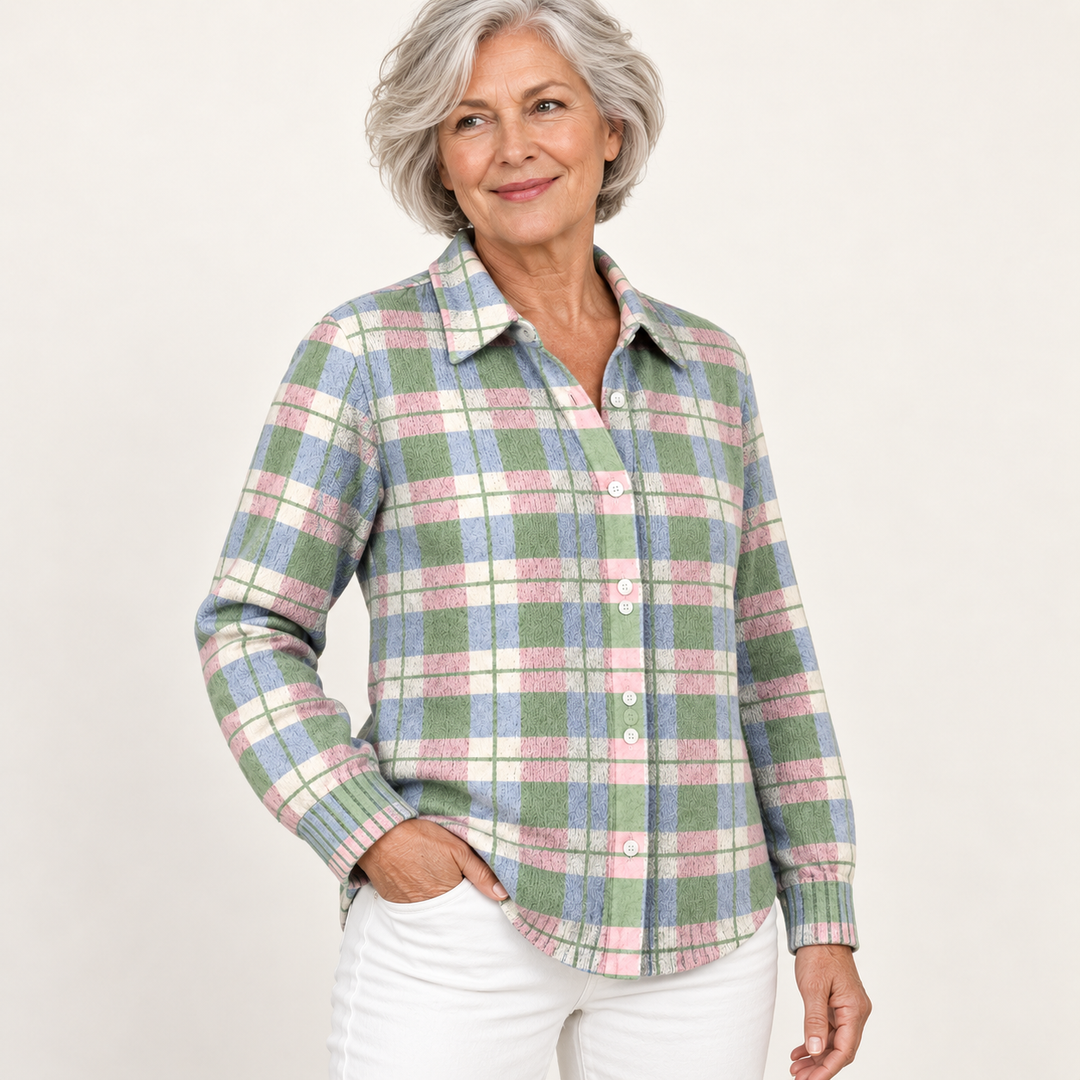 LENORA checked blouse worn by a mature British woman in a three-quarter studio view