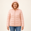 METTA Light Pink padded jacket on mature model, front view