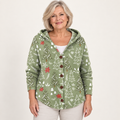 Eulalie Festive Forest Hooded Cardigan worn by a mature woman on a clean studio background