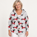 Pamela Festive Dog-Print Hooded Cardigan worn by a mature woman on a clean studio background