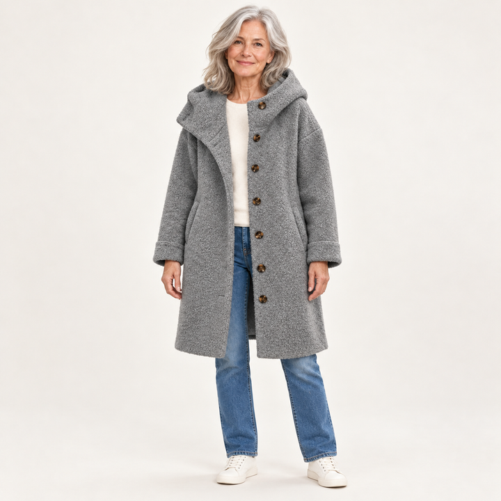 Grey hooded coat on mature model